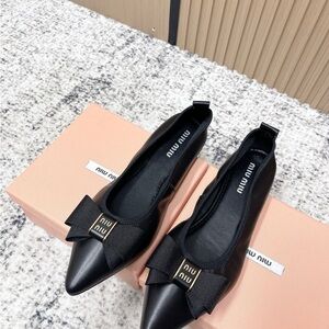 Miu Miu Black Flats with Bow Accent